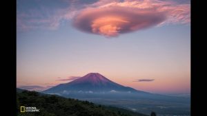 lenticular-clouds-glowing-pink-in-the-sunrise-hover-over-mount-fuji-in-onuma-yamanashi-japan