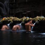 men-take-part-in-a-bathing-ritual-in-the-tirta-empul-temple-in-bali-the-temples-fresh-spring-water-is-believed-to-be-holy-water-t